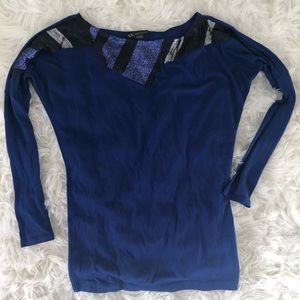 Blue long sleeve with detailing around neckline